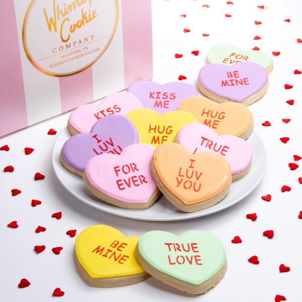 Each set of 12 cookies is made with our incredible sugar cookie recipe, thick, soft and oh so yummy! Each cookie is heat sealed and shipped in our signature pink and white striped box.